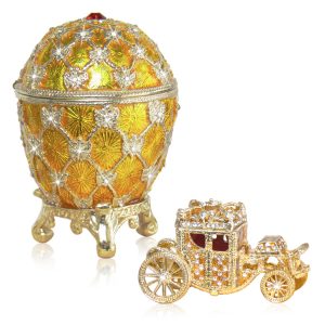 Golden Coronation egg set with a faberge carriage trinket box